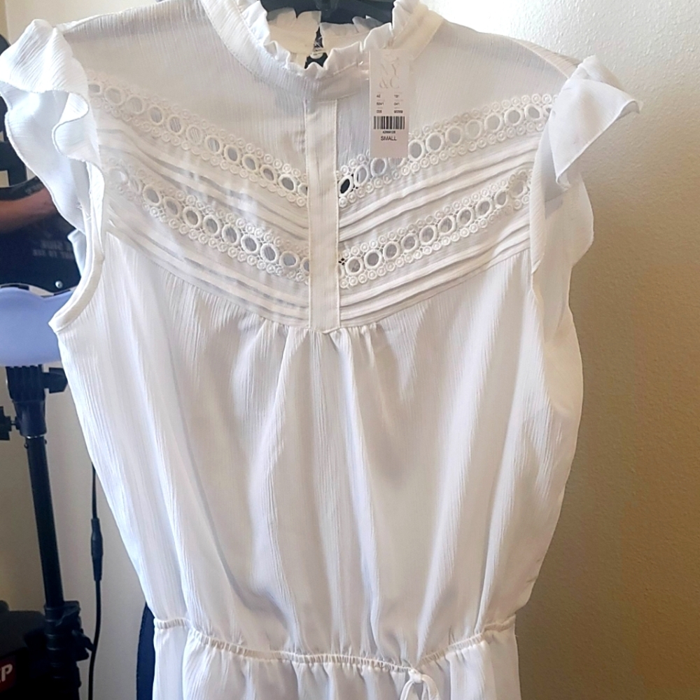 White eyelet ruffle blouse